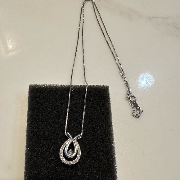 Kay Jewelers Love’s Embrace 1/4 karat diamond necklace with matching earrings. - Picture 4 of 6